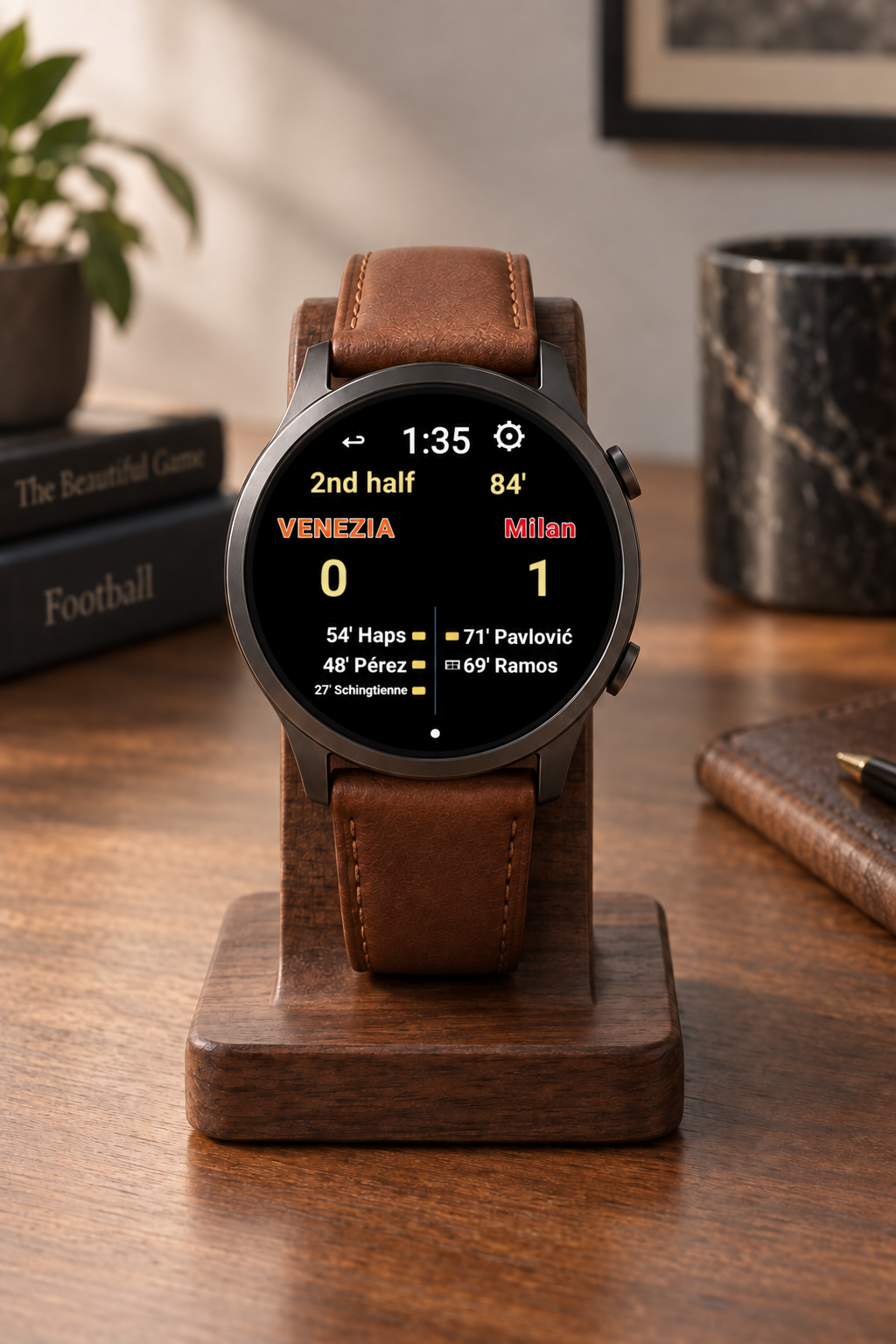 European Football Watch with a live match score displayed on a walnut desk stand with a fine brown leather band